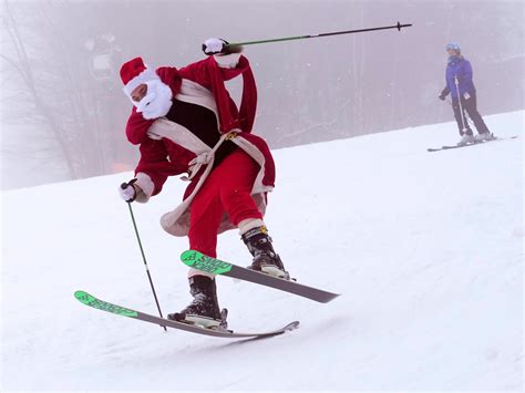 Skiing Santas hit the slopes in Maine